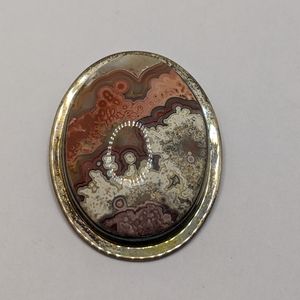 Brown and white stone pendant